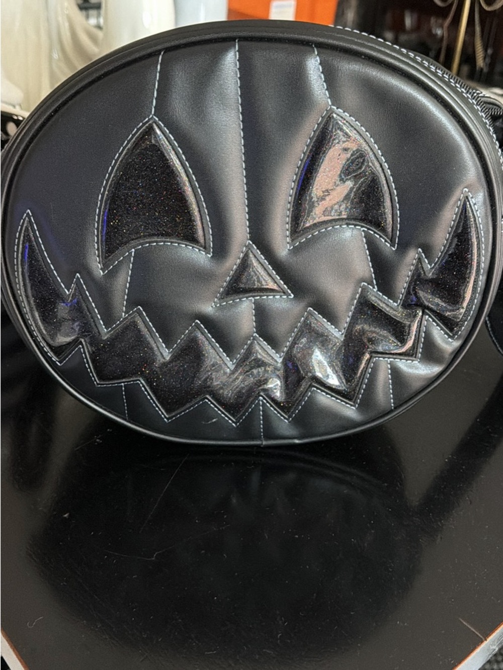 Sleek Black Pumpkin-Accent Crossbody Bag for Women
